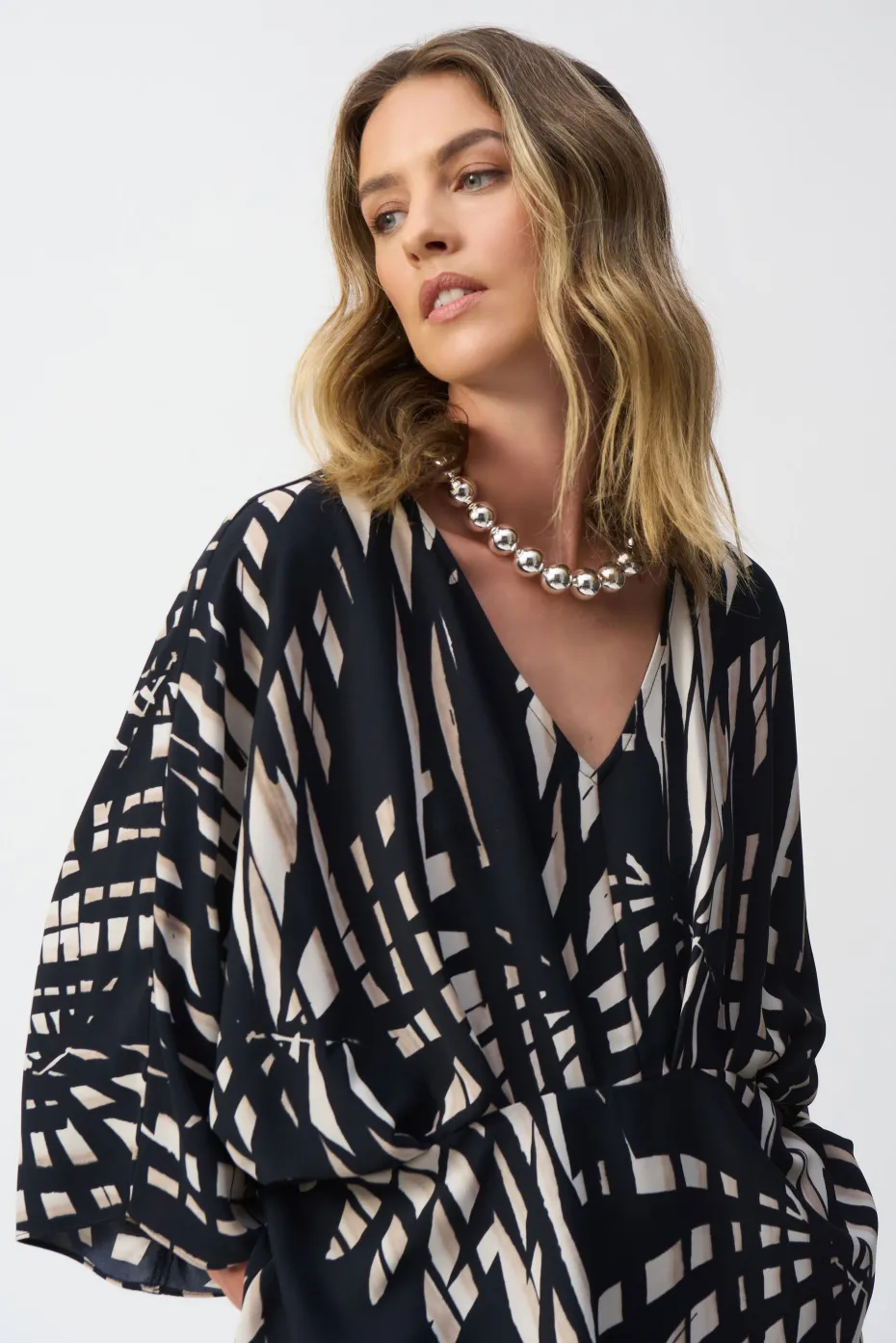 Joseph Ribkoff Peplum Top in Black Vanilla Tropical 251047