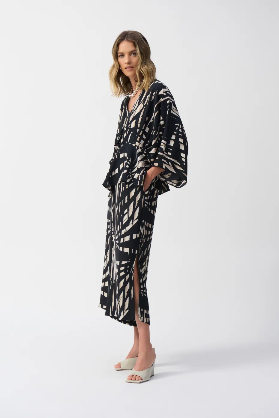 Joseph Ribkoff Peplum Top in Black Vanilla Tropical 251047