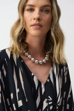 Joseph Ribkoff Peplum Top in Black Vanilla Tropical 251047