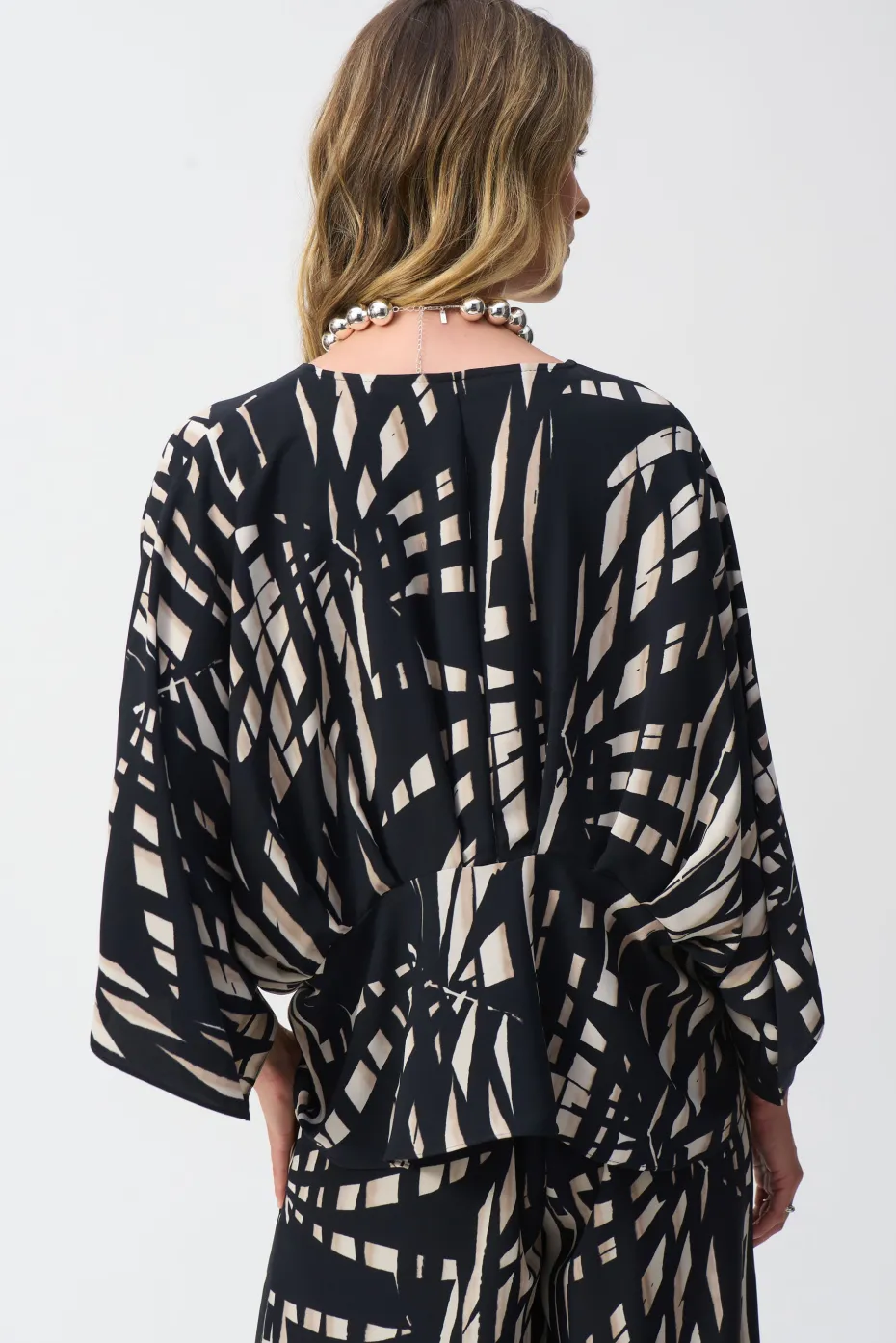 Joseph Ribkoff Peplum Top in Black Vanilla Tropical 251047